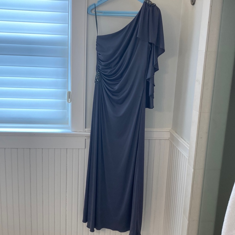 Cachet long gray gown with embellishment stones on waist and shoulder